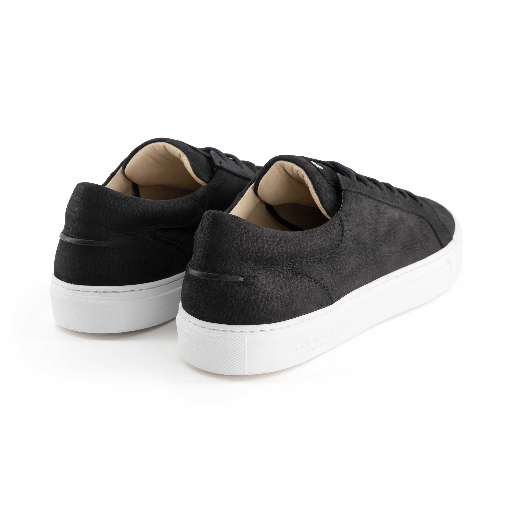 Italian leather sneaker in black nubuck leather with white outsole