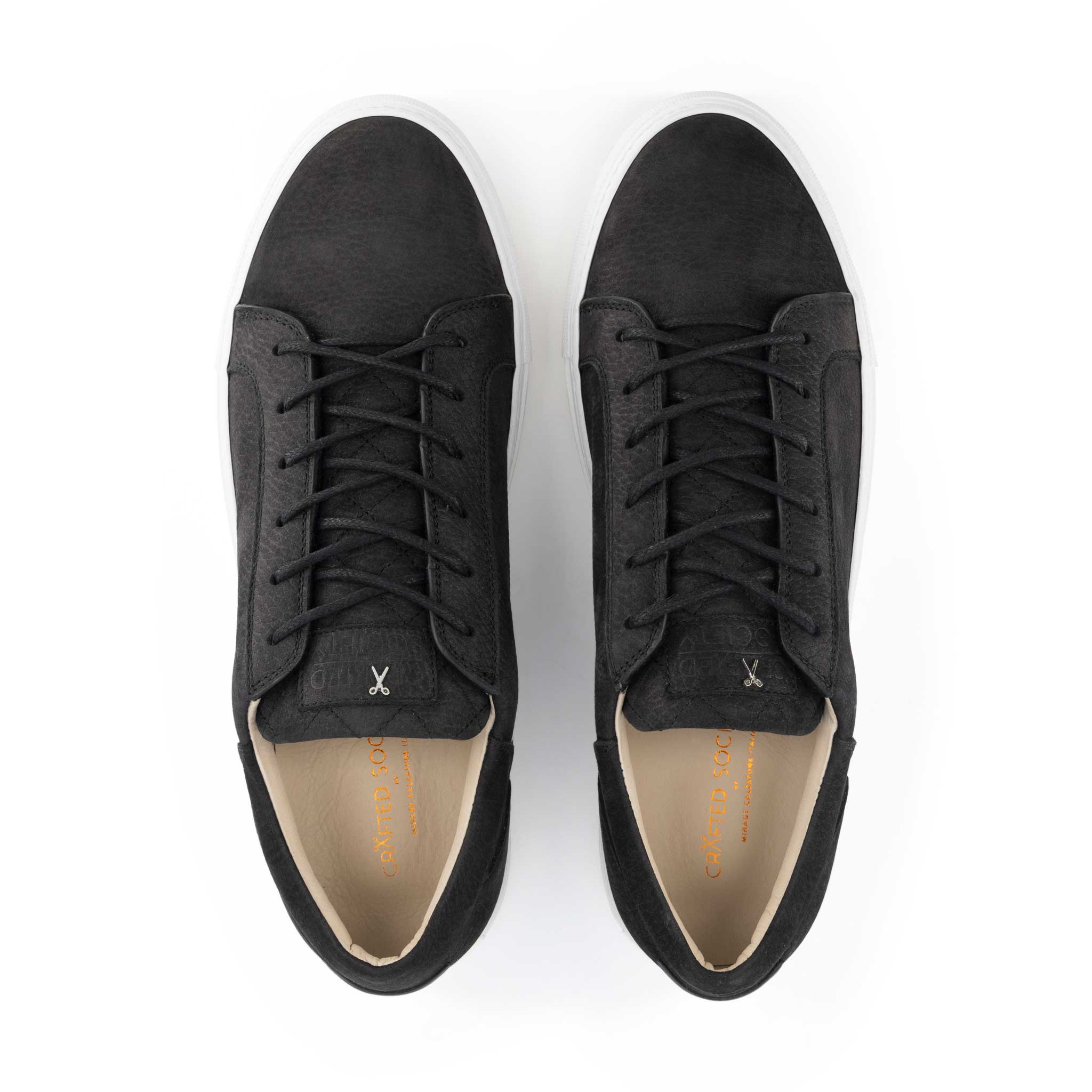 Italian leather sneaker in black nubuck leather with white outsole